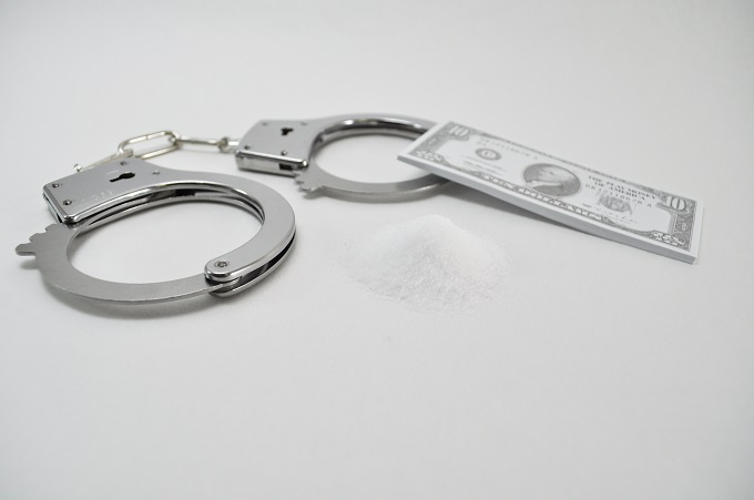 ドル札と手錠